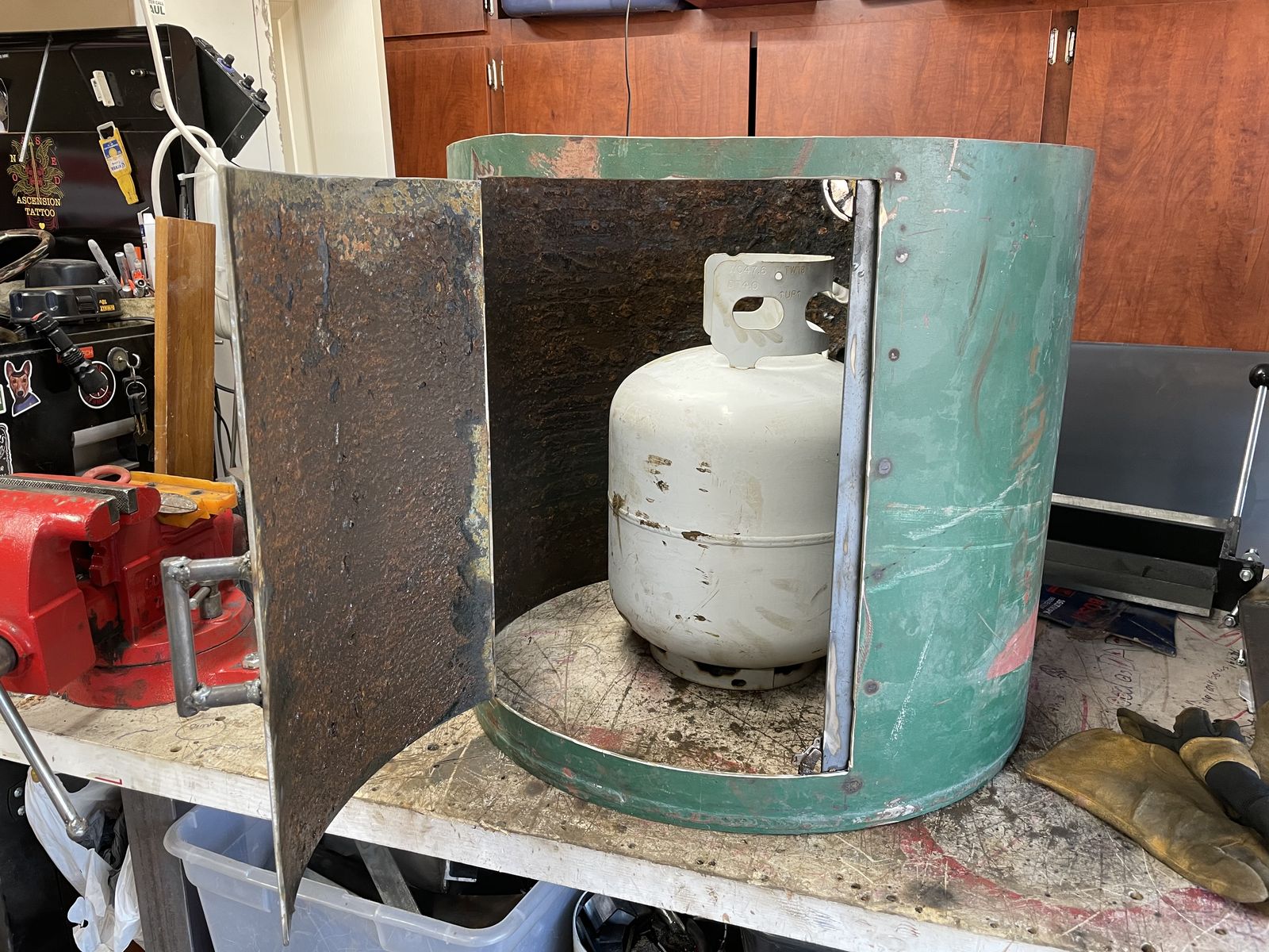 Access door cut in so the propane tank hides inside.